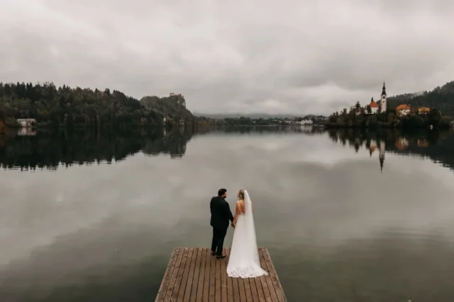 A rainy day at Lake Bled added a unique touch of magic to this wedding. The mist over the water, the gentle dance of raindrops, and the intimate atmosphere made every moment unforgettable. 
.
.
.
#bride #wedding #weddingmoments #weddingdress 
#truccosposa #truccomatrimonio #truccocerimonia #greenweddingshoes #lovemydress #flowerdesign
#bridesmaidsdresses #englishwedding
#italianweddings #italianwedding #tuscanywedding #intimatewedding #lakebled #weddingday #americanwedding #wedding2024 #realwedding #tuscanyweddingvideographer #dji #italyweddingvideographer #lakebledweddingphotographer #lakebledcastle